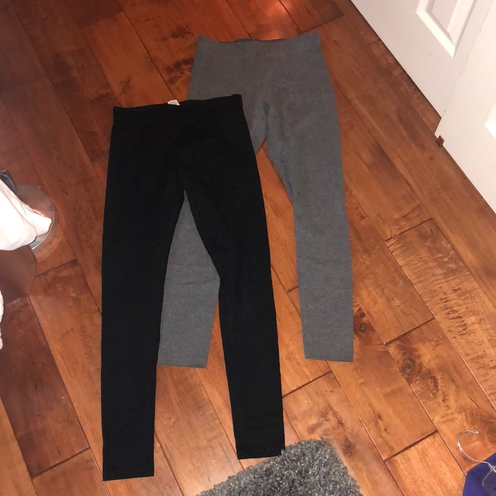 One Black and two gray cotton leggings